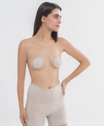 girl wearing microbra nipple covers