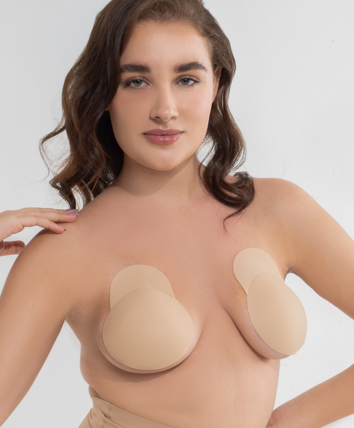 girl wearing nipgrips liftup nipple covers