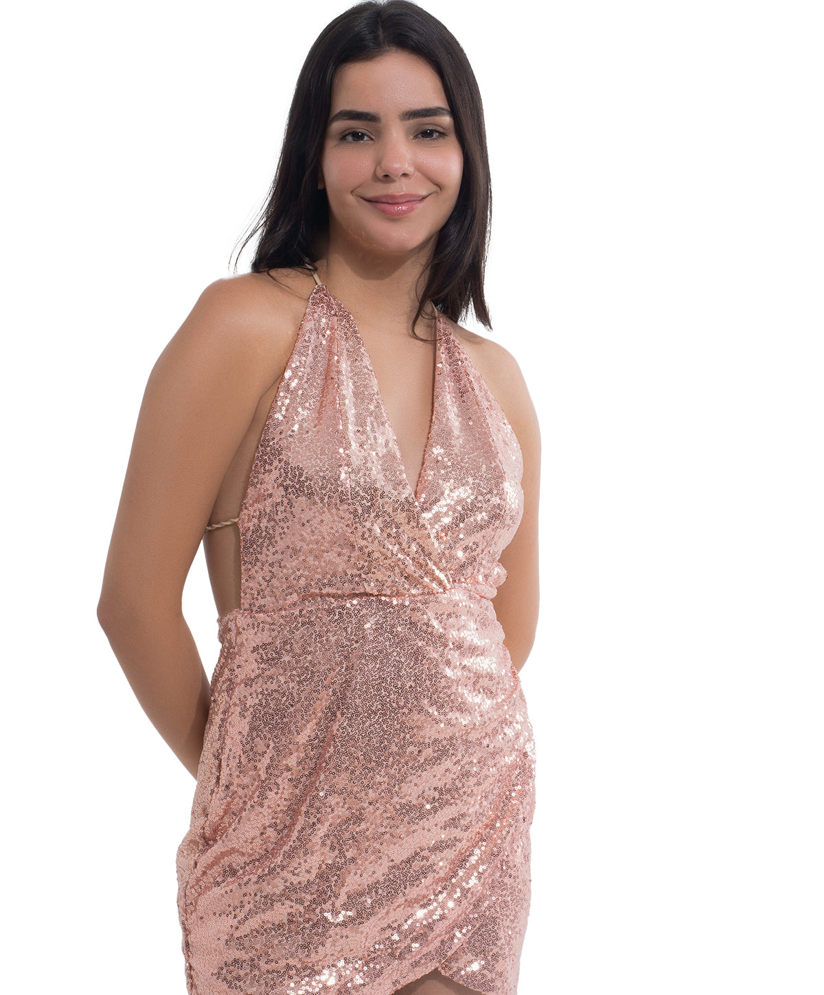 Model in a shimmering beige sequined dress wearing BareEase underneath with a halter neckline