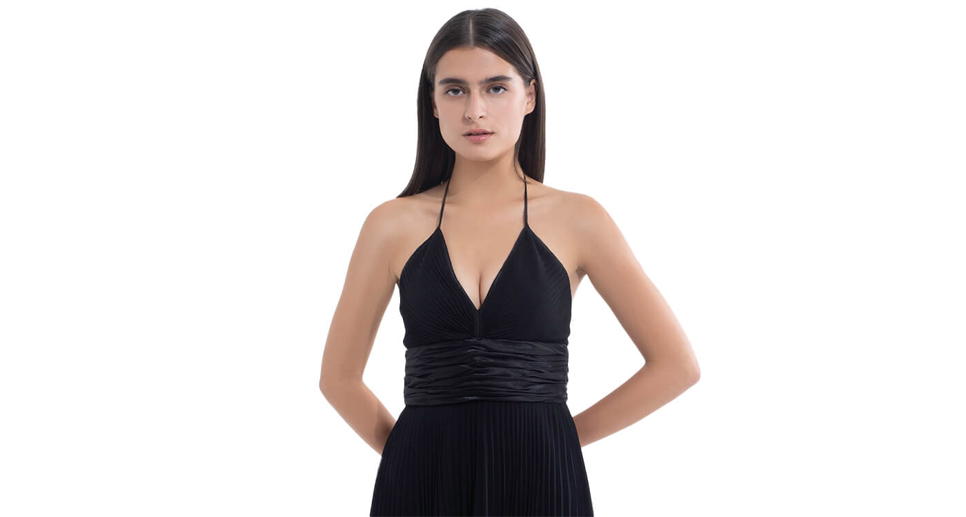 Model in black dress, after wearing Nippetals BareEase adhesive strapless bra