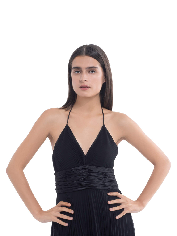 Model in black dress, before wearing Nippetals BareEase adhesive strapless bra