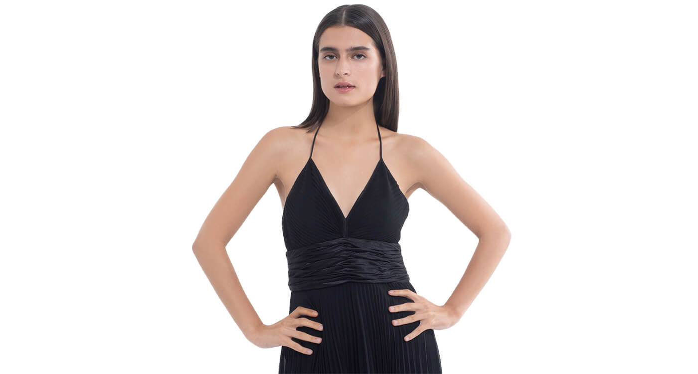 Model in black dress, before wearing Nippetals BareEase adhesive strapless bra