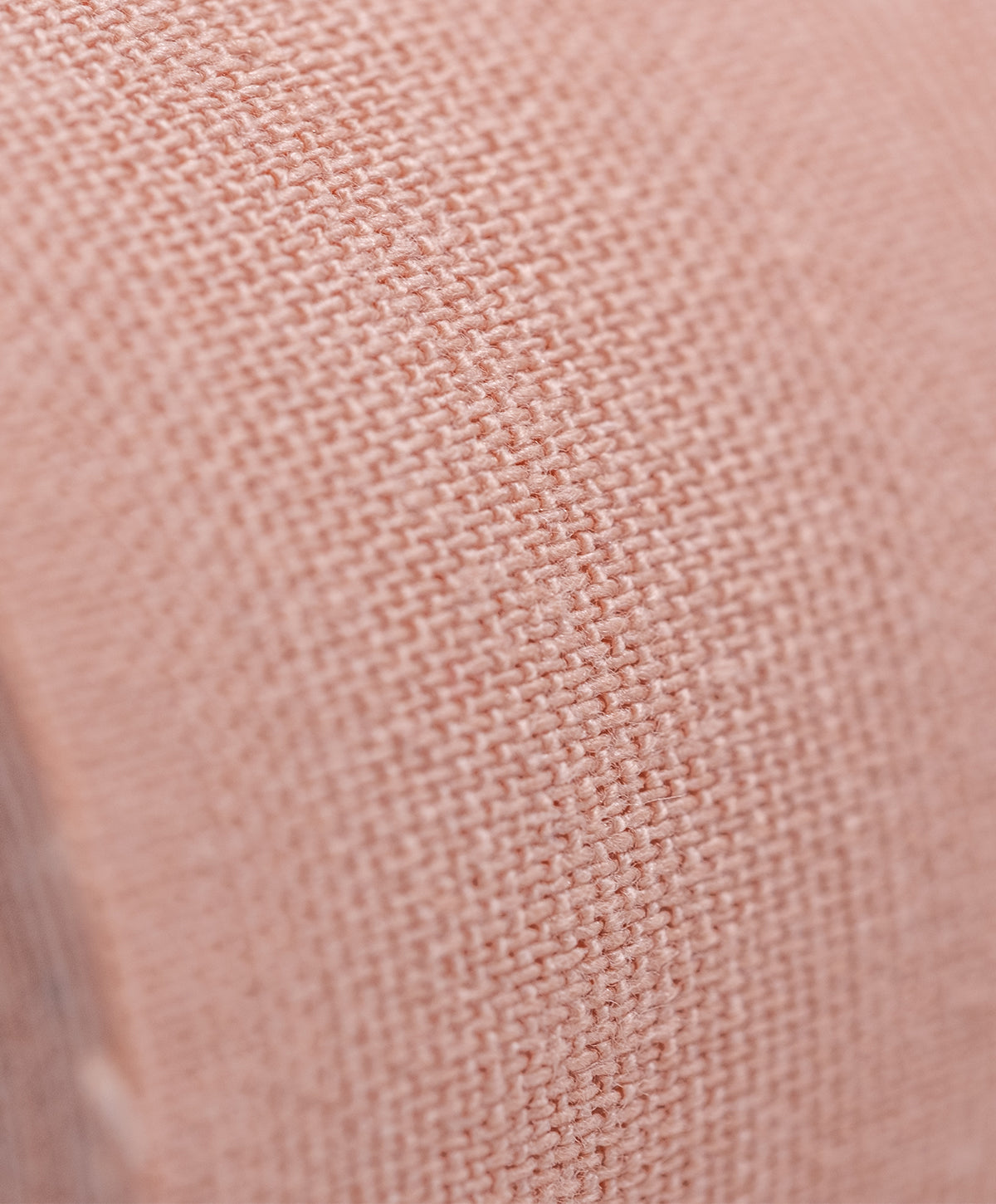 Close-up of textured nude fabric of Nippetals boob tape, featuring a tight knit pattern for enhanced control and comfort