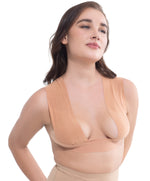 Model wearing GlamTape, offering secure hold and support with an invisible lift, perfect for a confident, backless look