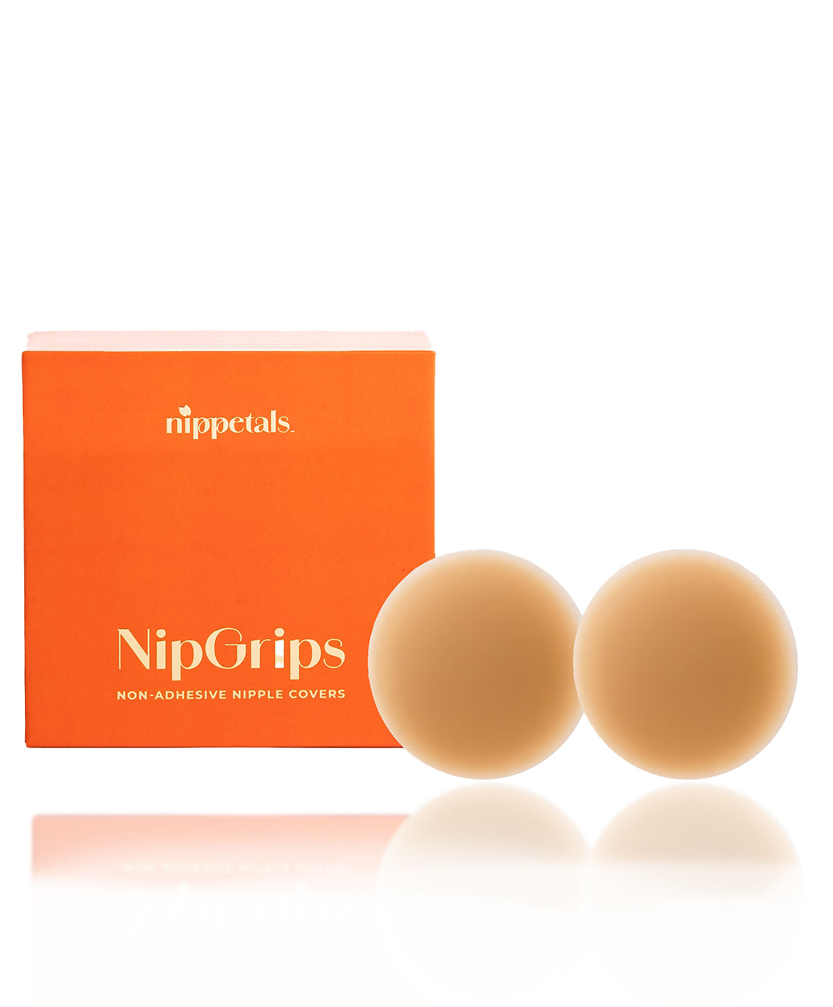 Nippetals NipSticks non-adhesive nipple covers displayed in front of their packaging box, showcasing its reusable design